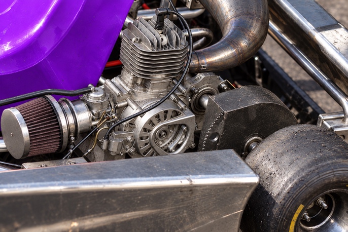 Reference image of a 170 cubic centimetre two-stroke engine installed in a kart